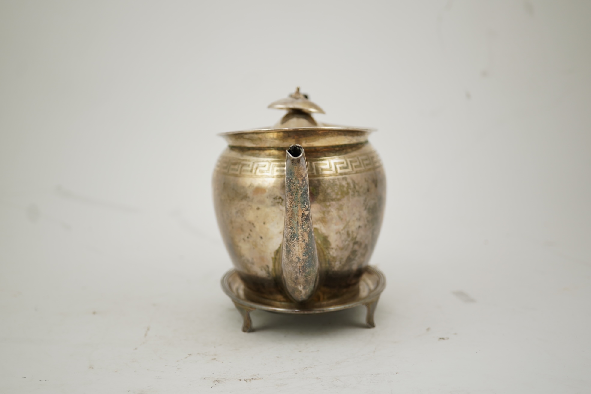 A George III silver oval teapot and matching oval stand, by John Eames